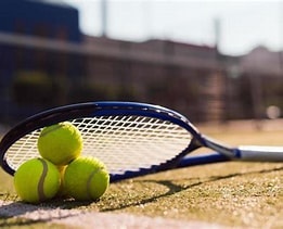 Tennis racket and balls
